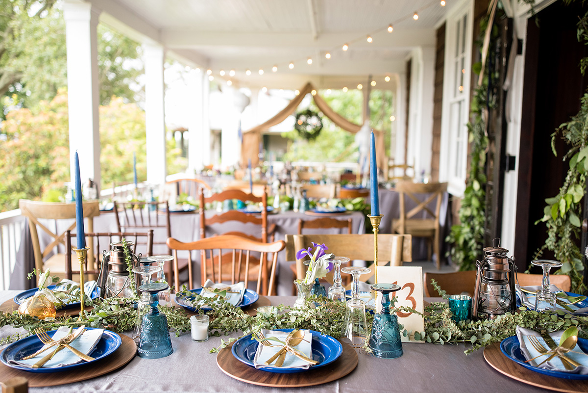 wedding reception table setting with a boho glamping theme